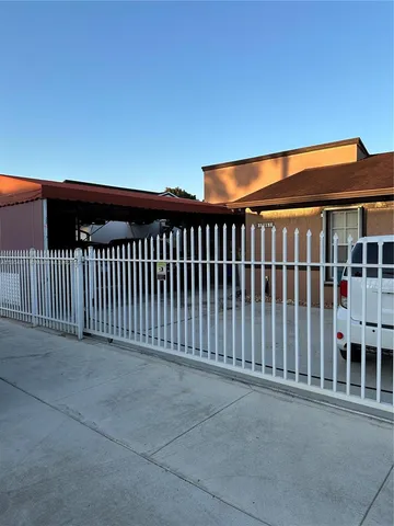a view of a car park in front of a building
