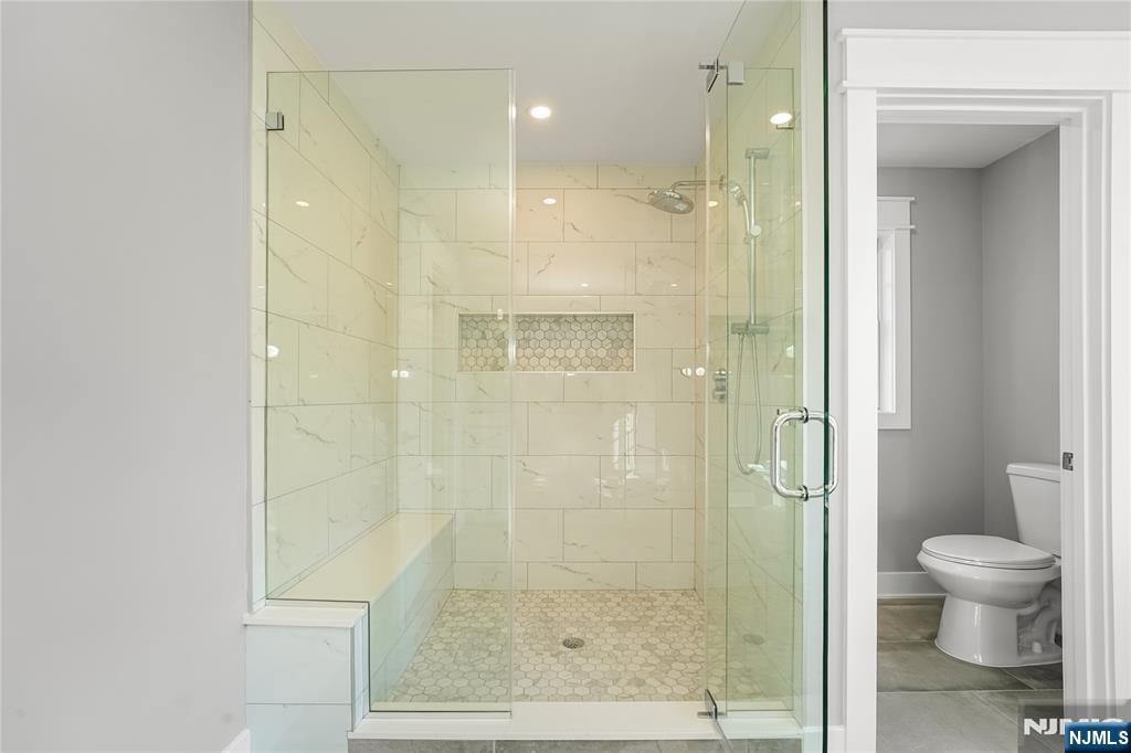 1 Lourdes Court Andover, NJ 07821 - Photo 22 of 40 a bathroom with a shower and a toilet