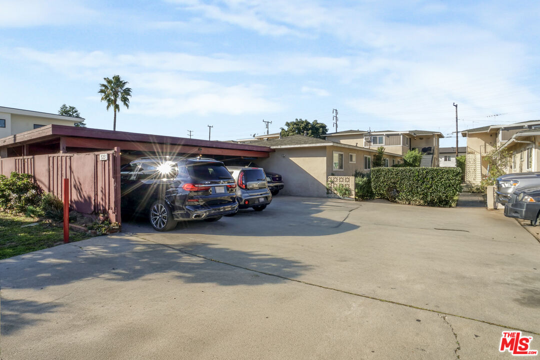 723 Indiana Court El Segundo, CA 90245 - Photo 2 of 4 a view of car parked in front of garage