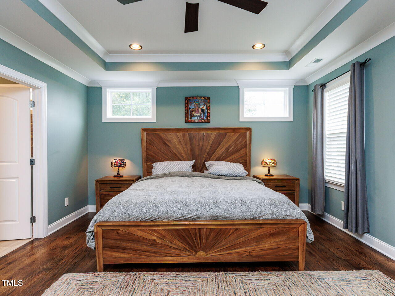802 Lynn Road Durham, NC 27703 - Photo 19 of 41 Beautiful Primary Suite with double tray, site finished hardwood flooring, recessed lighting, fan and amazing spa.