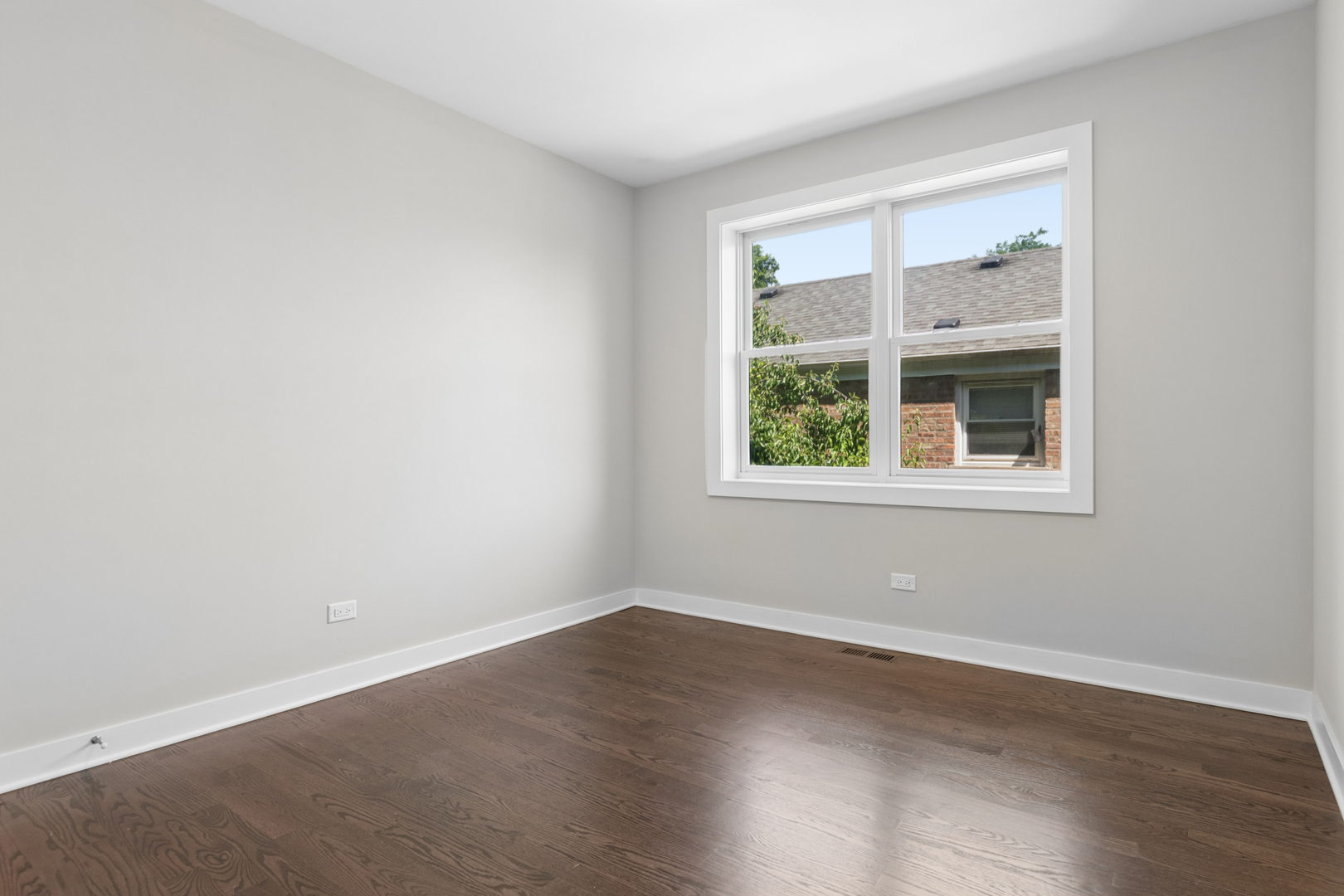 4845 North Keystone Avenue, Unit 2N Chicago, IL 60630 - Photo 19 of 21 an empty room with a window