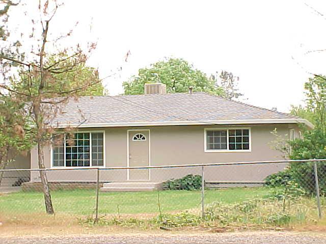 7645 Happy V Road Anderson, CA 96007 - Photo 1 of 3 a house view with a backyard space