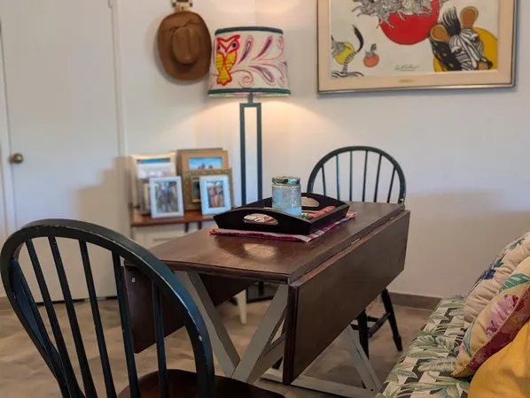 a view of a dining room with furniture