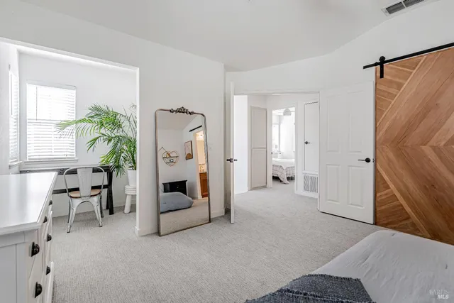 a view of a livingroom with furniture and a livingroom
