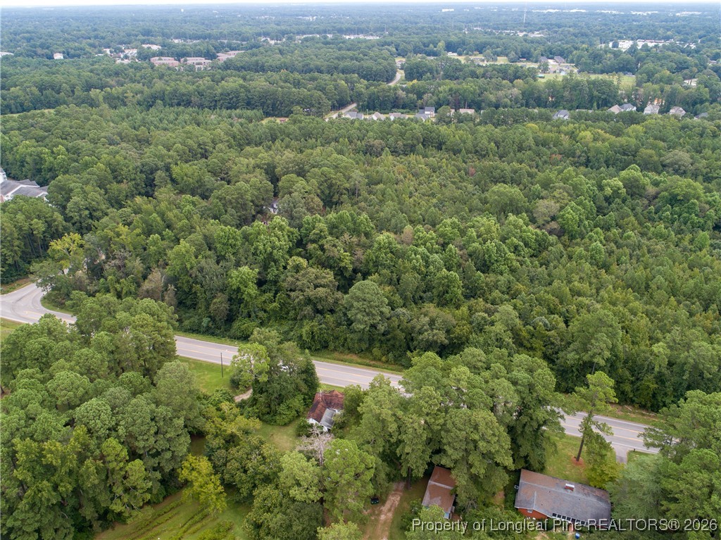 0 Seventy First School Road Fayetteville, NC 28314 - Photo 11 of 17 an aerial view of residential houses with outdoor space and trees