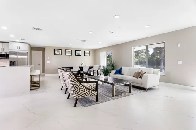 a living room with furniture and a couch