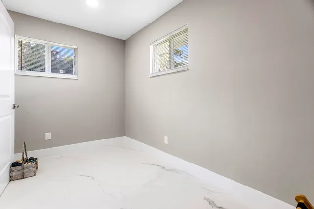 a bathroom with a sink vanity and a mirror
