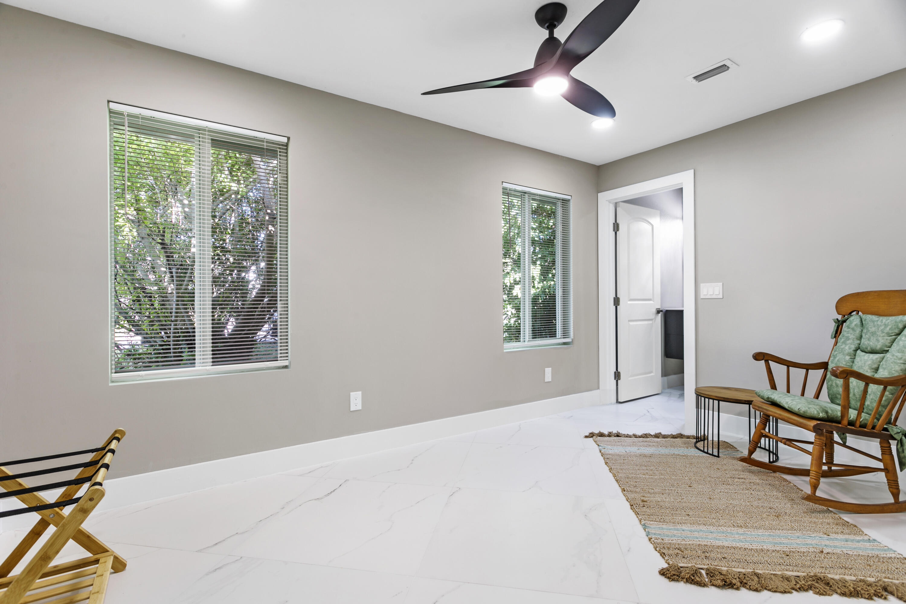 5200 Club Road Haverhill, FL 33415 - Photo 25 of 33 a living room with furniture and a window