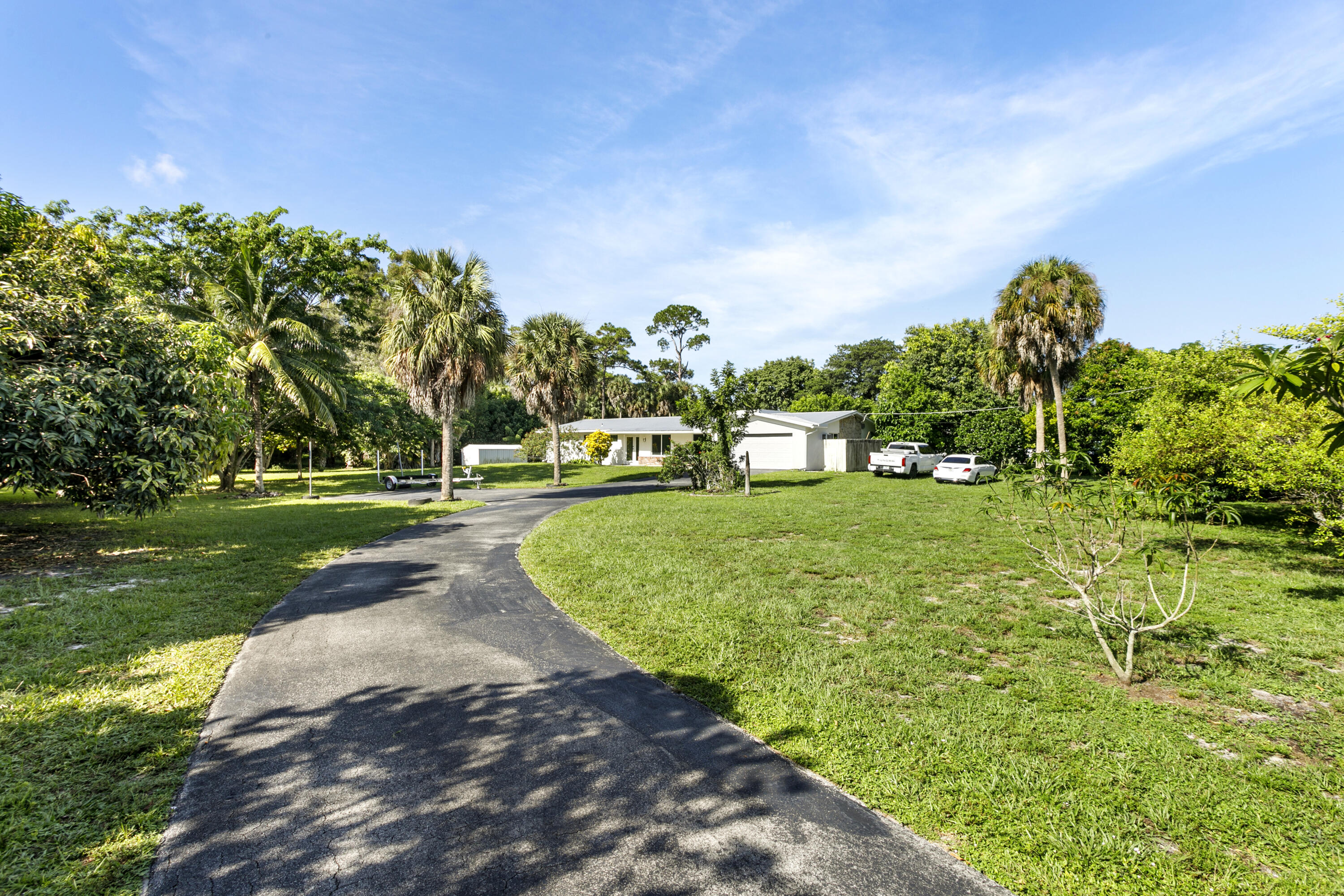 5200 Club Road Haverhill, FL 33415 - Photo 32 of 33 a view of a park with large trees