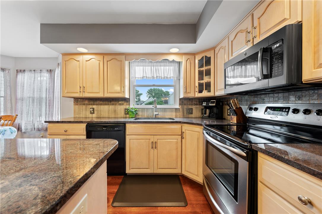 4568 Greenfield Road Bethlehem, PA 18017 - Photo 18 of 59 Granite counters and stainless steel appliances outfit this functional kitchen.