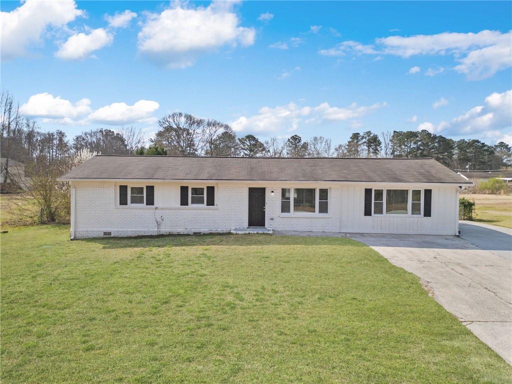 708 Morris Road Hiram, GA 30141 - Photo 1 of 1 a view of a yard in front of the house