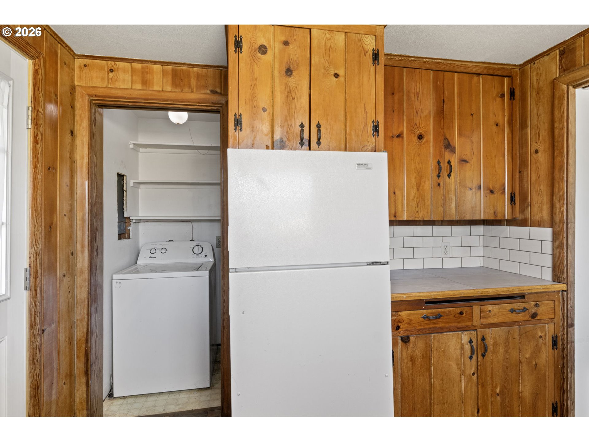 1008 Coburg Road Eugene, OR 97401 - Photo 12 of 46 a utility room with dryer and washer