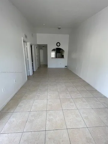 a view of a refrigerator and window