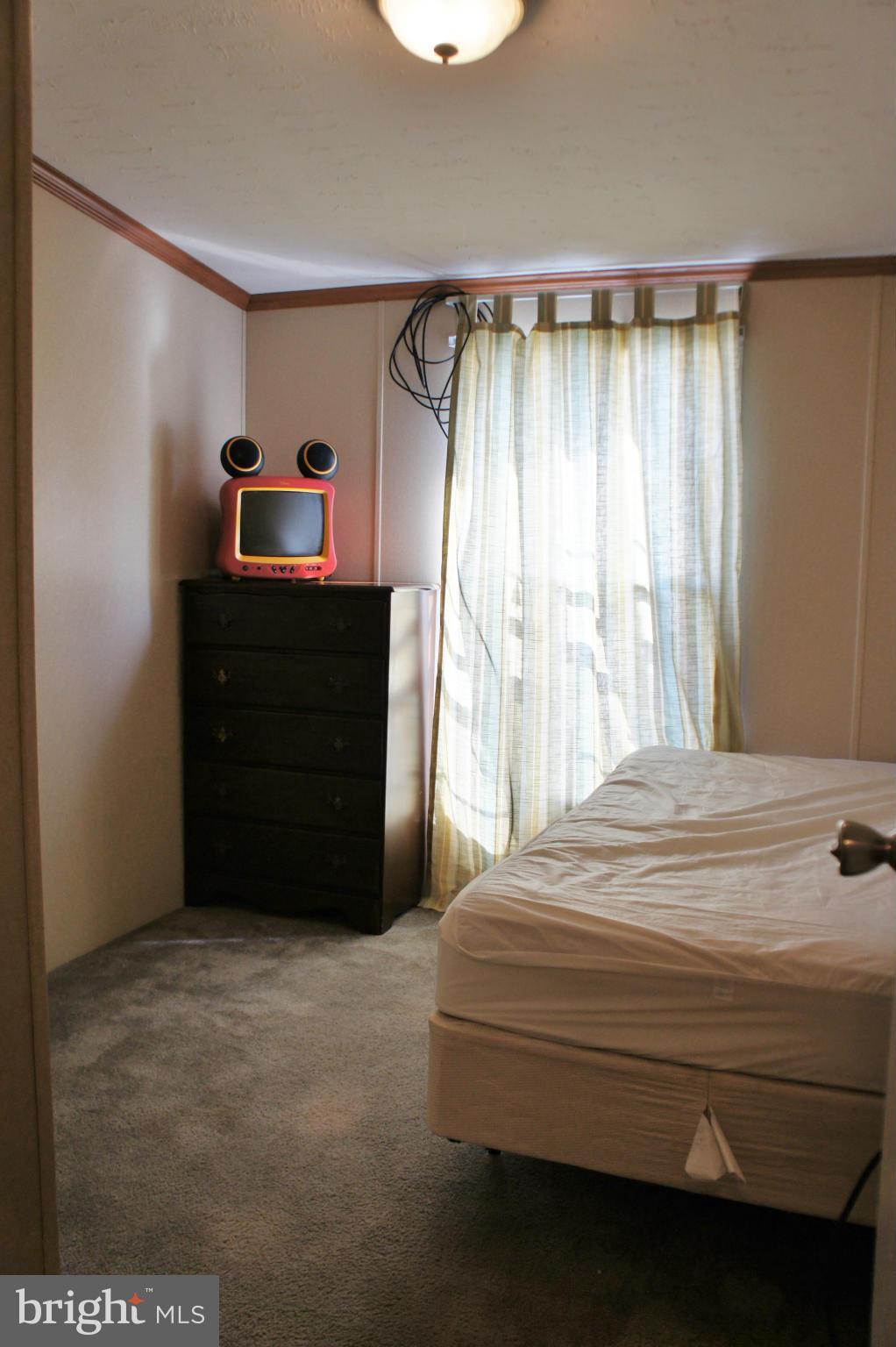 118 German Chapel Road Prince Frederick, MD 20678 - Photo 17 of 27 a bedroom with a bed and a closet