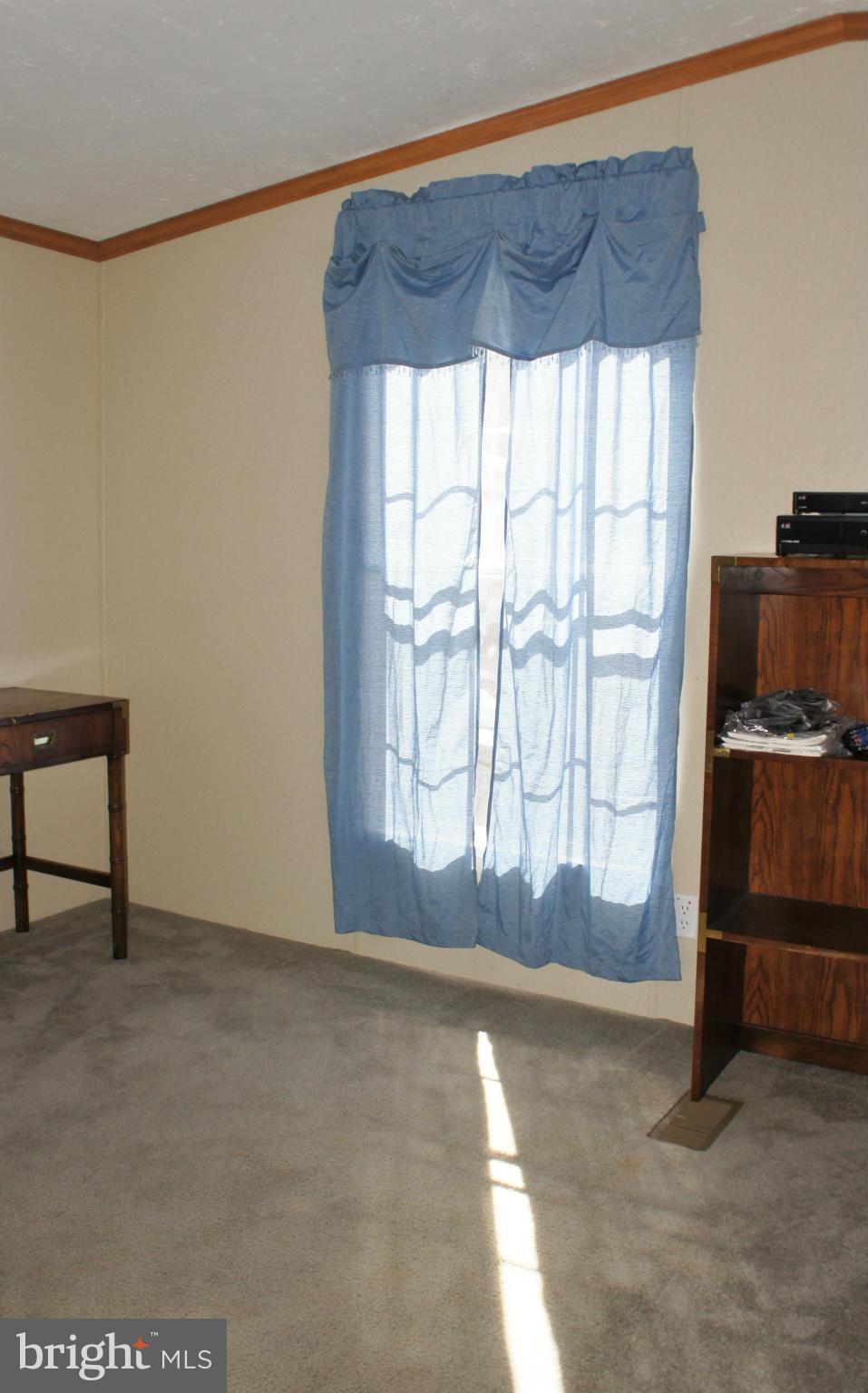 118 German Chapel Road Prince Frederick, MD 20678 - Photo 20 of 27 a view of an empty room with a window