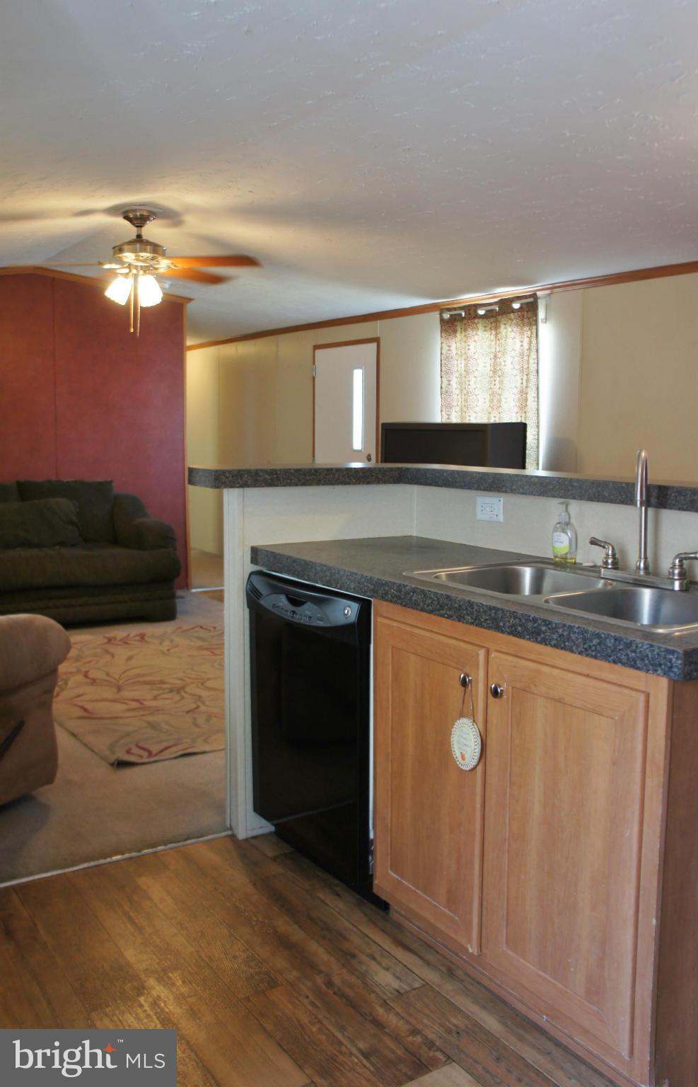 118 German Chapel Road Prince Frederick, MD 20678 - Photo 8 of 27 a kitchen with a sink and a mirror