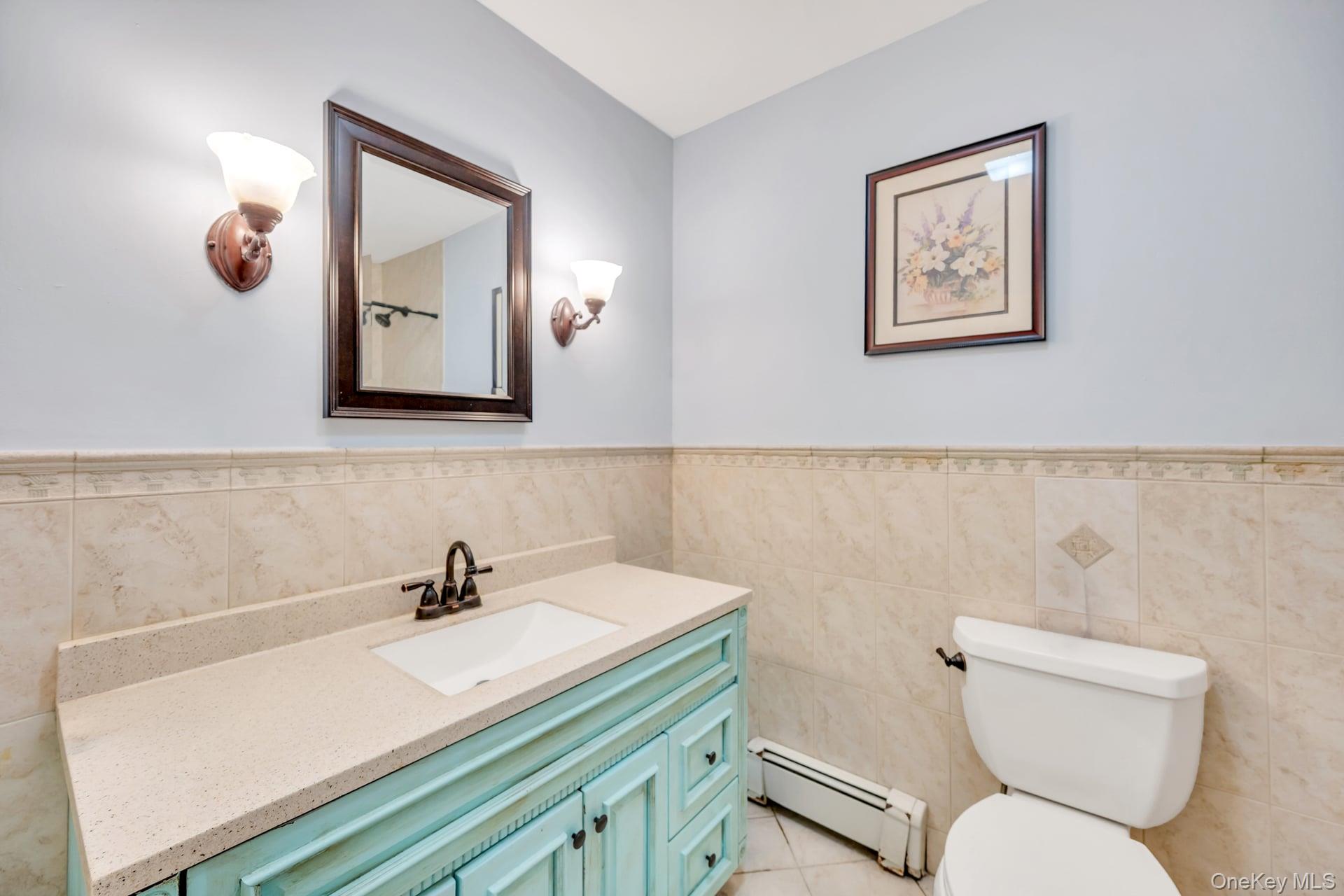 27 Westbrook Road Coram, NY 11727 - Photo 19 of 25 Updated Bathroom