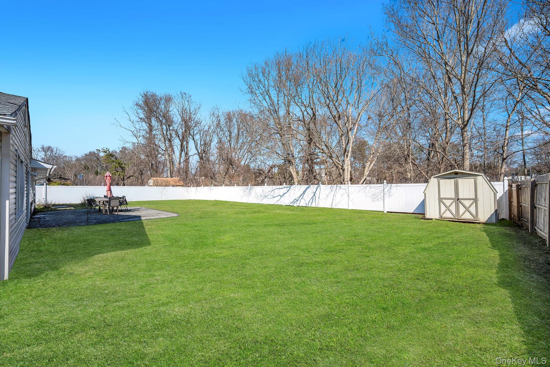 27 Westbrook Road Coram, NY 11727 - Photo 22 of 25 Beautiful Yard with Rear Patio