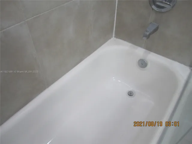 a view of kitchen and a window