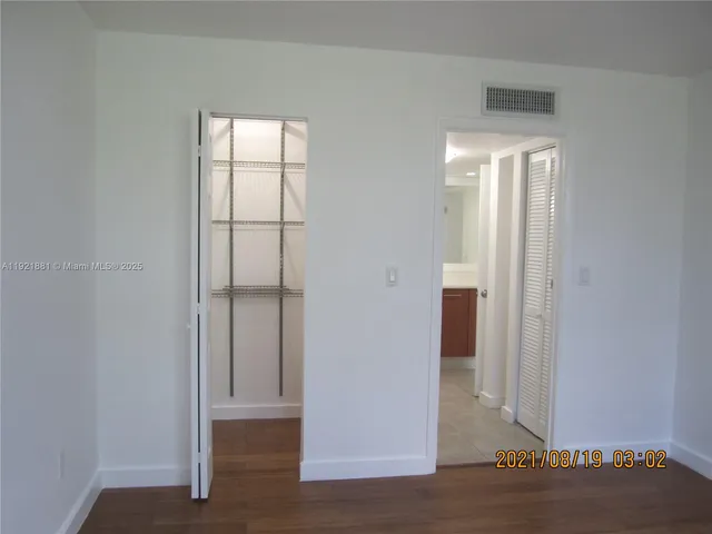 a bathroom with a sink and a window