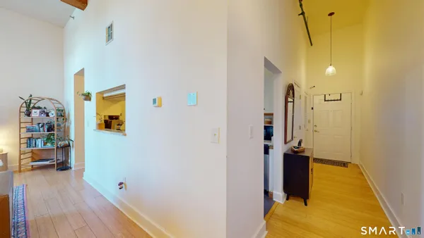a kitchen with a sink appliances and a counter top space