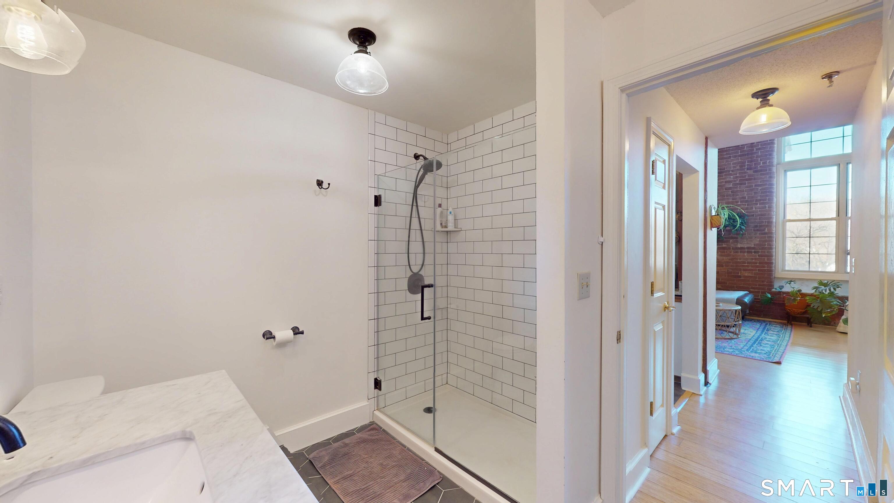 45 Main Street Plainfield, CT 06374 - Photo 16 of 20 a bathroom with a shower and a sink