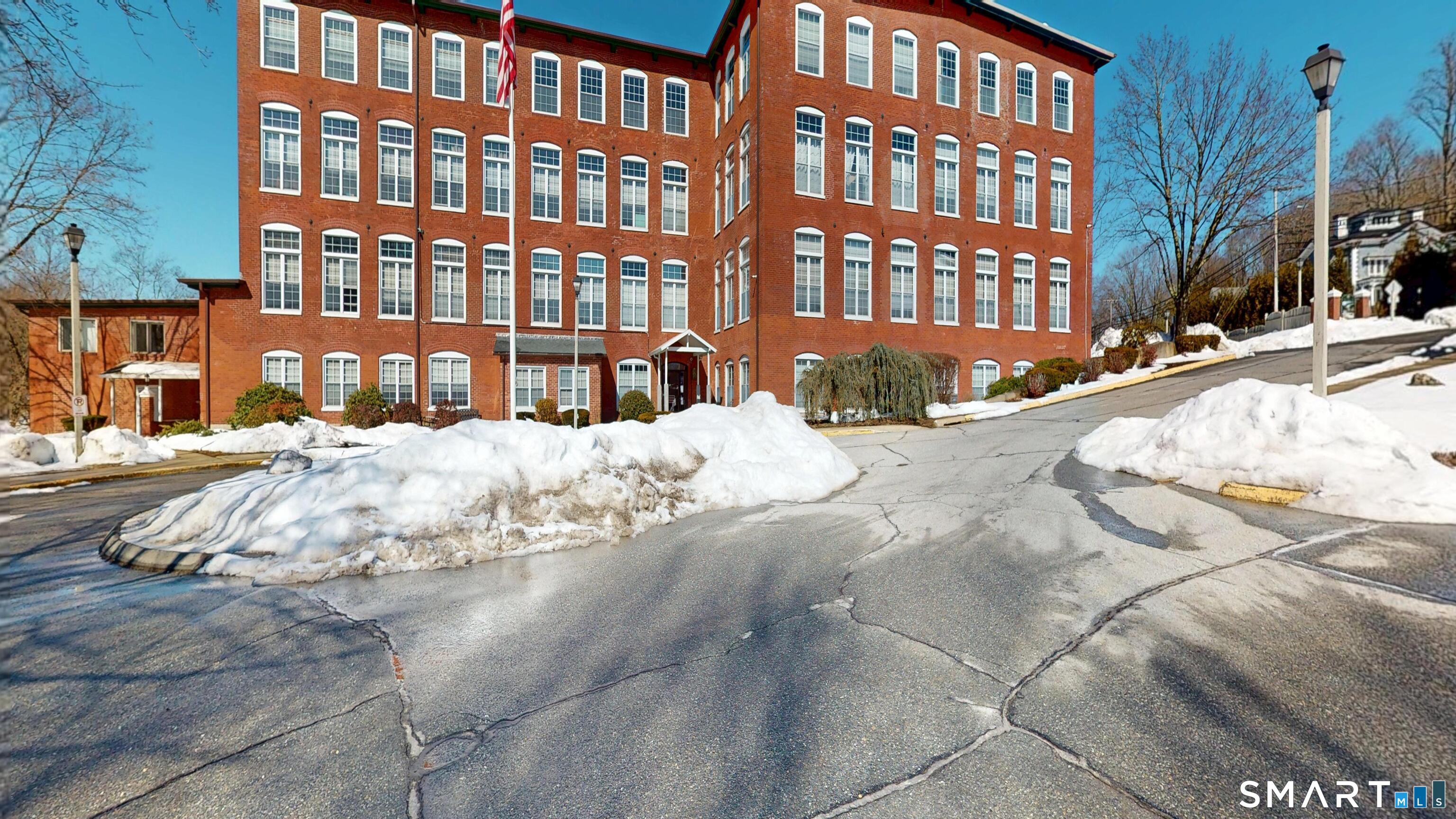 45 Main Street Plainfield, CT 06374 - Photo 19 of 20 a view of a building with a snow