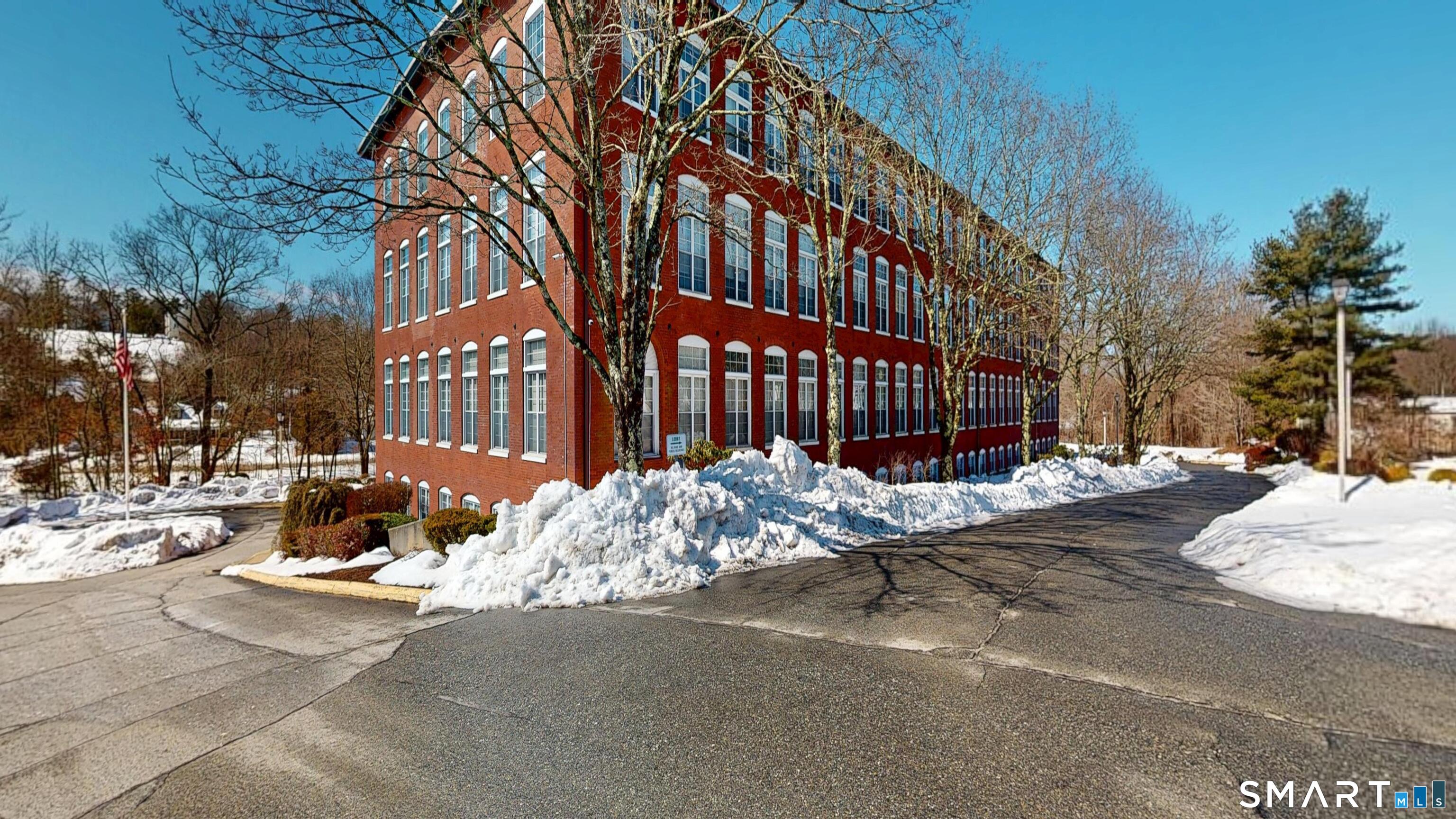 45 Main Street Plainfield, CT 06374 - Photo 20 of 20 a view of a street with a building in the background