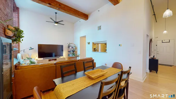 a view of a dining room with furniture
