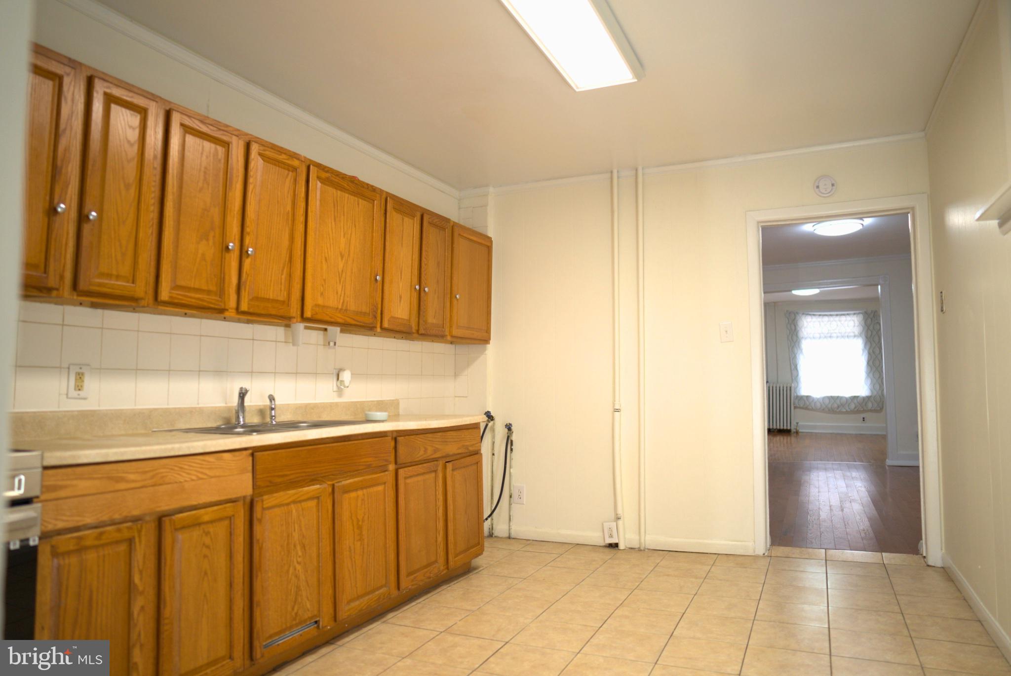 74 South Cedar Street Hazleton, PA 18201 - Photo 9 of 15 Bright and spacious kitchen area.