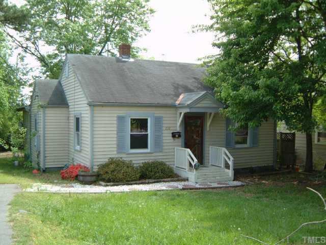 232 Georgetown Road Raleigh, NC 27608 - Photo 1 of 1 a view of a house with a backyard and a tree