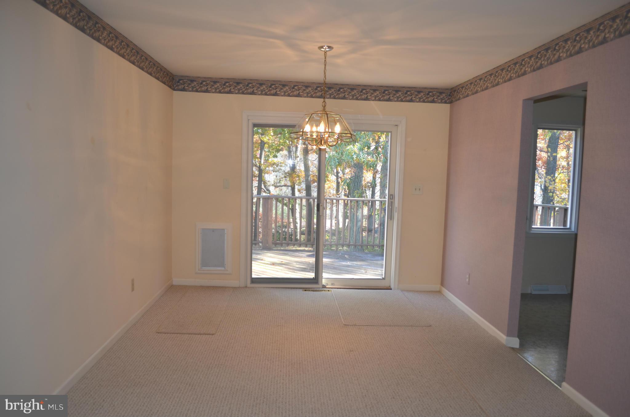 213 Garnett Road Joppa, MD 21085 - Photo 7 of 30 Room lends to full deck through Pella Slider Doors