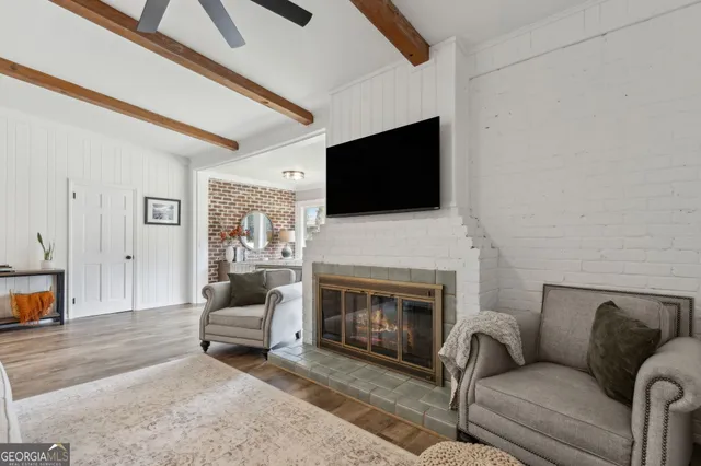 a kitchen with stainless steel appliances a refrigerator sink and cabinets