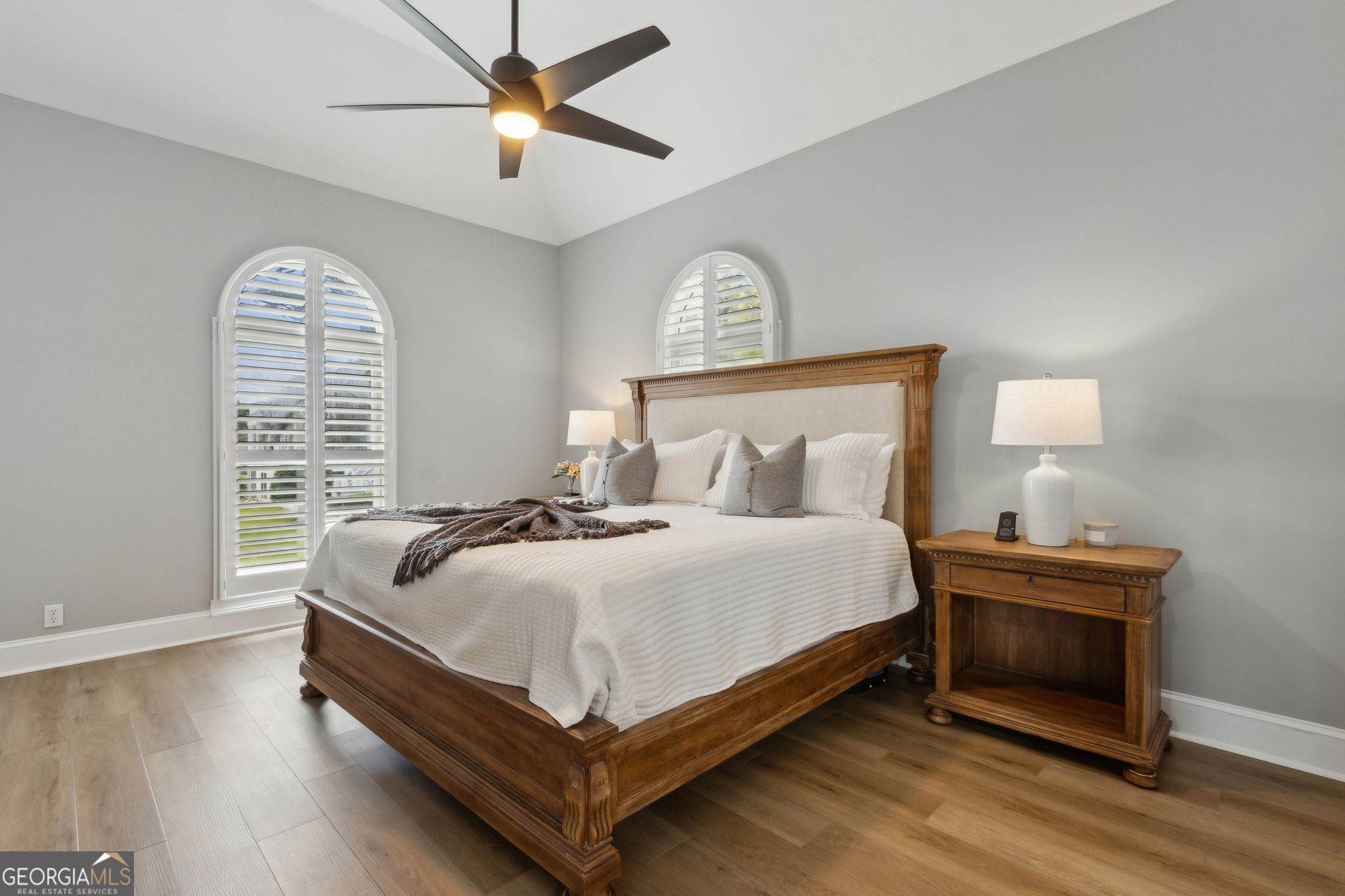 6 Stewart Lane Jekyll Island, GA 31527 - Photo 31 of 95 a bedroom with a bed and a window