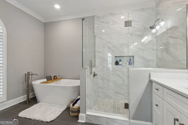 a view of a patio with a table and chairs and couches