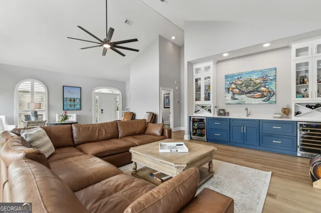 an aerial view of a house with a yard