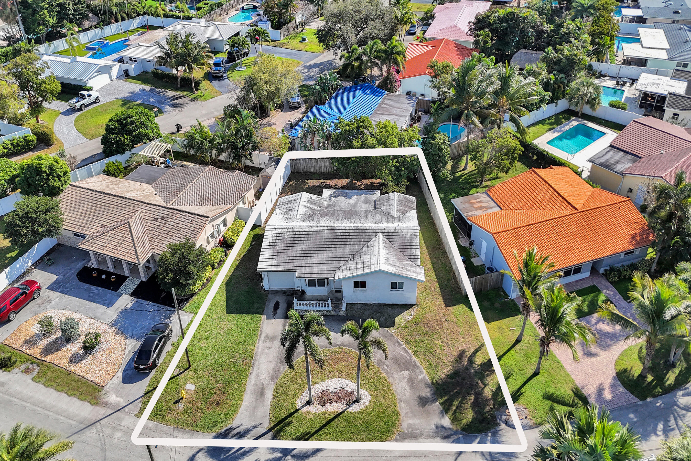 2110 Northeast 29th Street Lighthouse Point, FL 33064 - Photo 4 of 11 an aerial view of a house with a yard