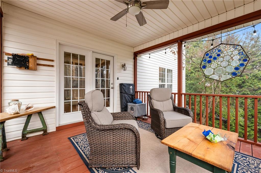 7602 Wilson Farm Road Summerfield, NC 27358 - Photo 3 of 50 Screened porch w/ceiling fan