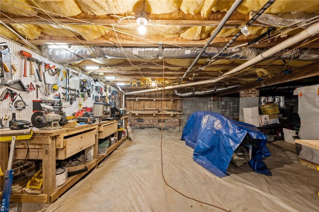 7602 Wilson Farm Road Summerfield, NC 27358 - Photo 6 of 50 Floored crawlspace, used as workshop