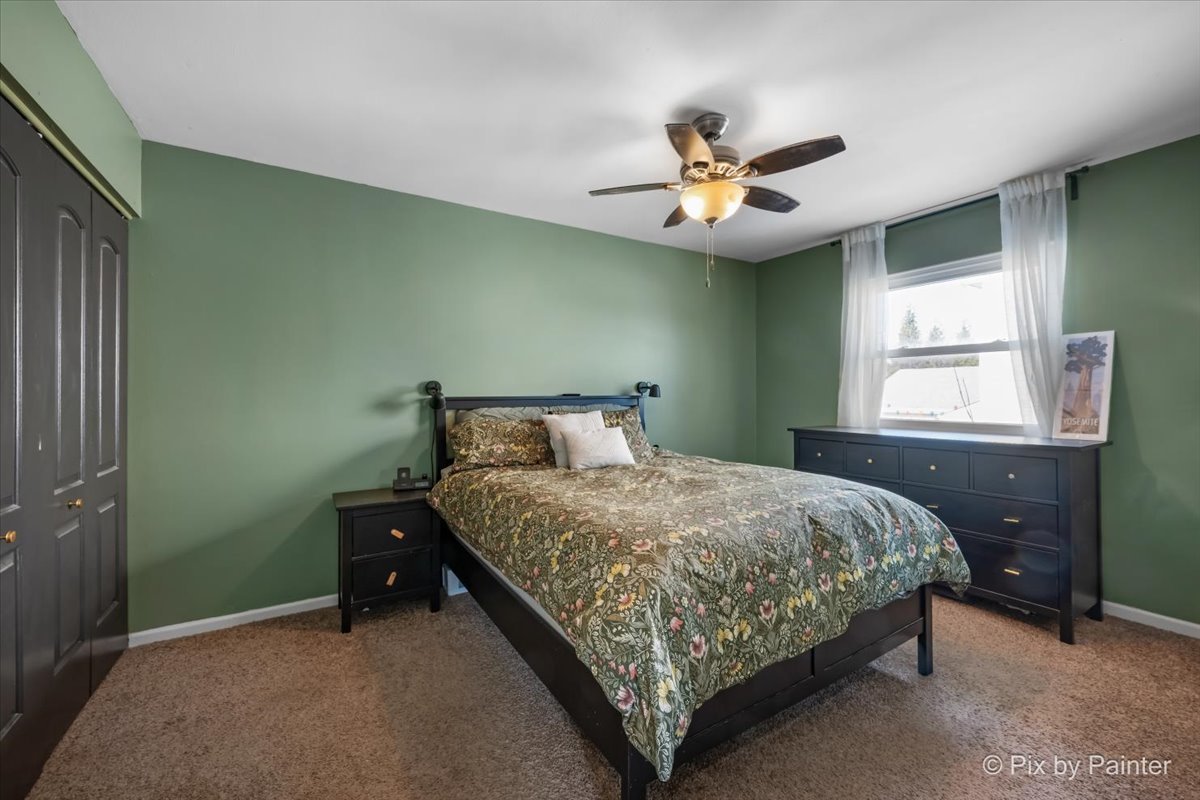 320 Homestead Drive Bolingbrook, IL 60440 - Photo 15 of 33 a bedroom with a bed and window