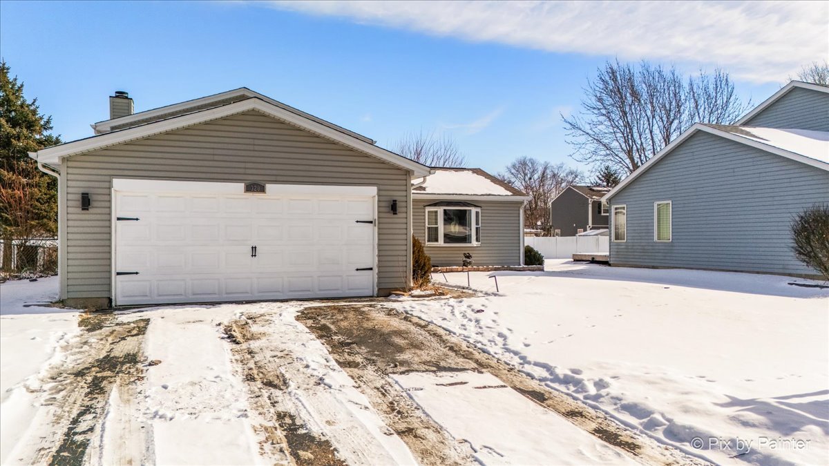 320 Homestead Drive Bolingbrook, IL 60440 - Photo 22 of 33 a front view of a house with a yard