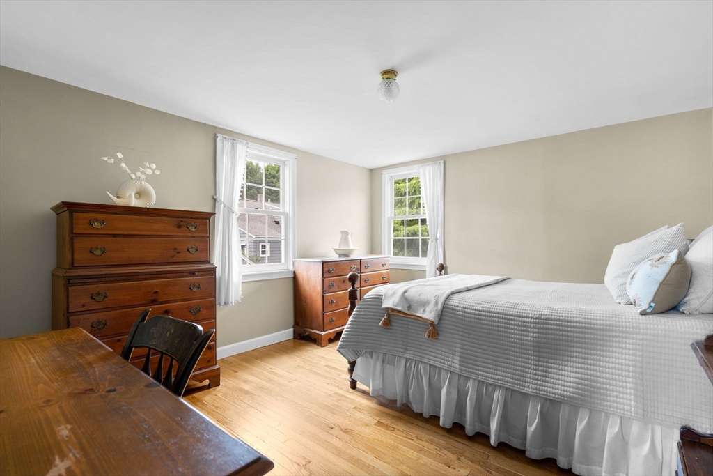 11 Sagamore Road Belmont, MA 02478 - Photo 23 of 41 a bedroom with a bed and a dresser