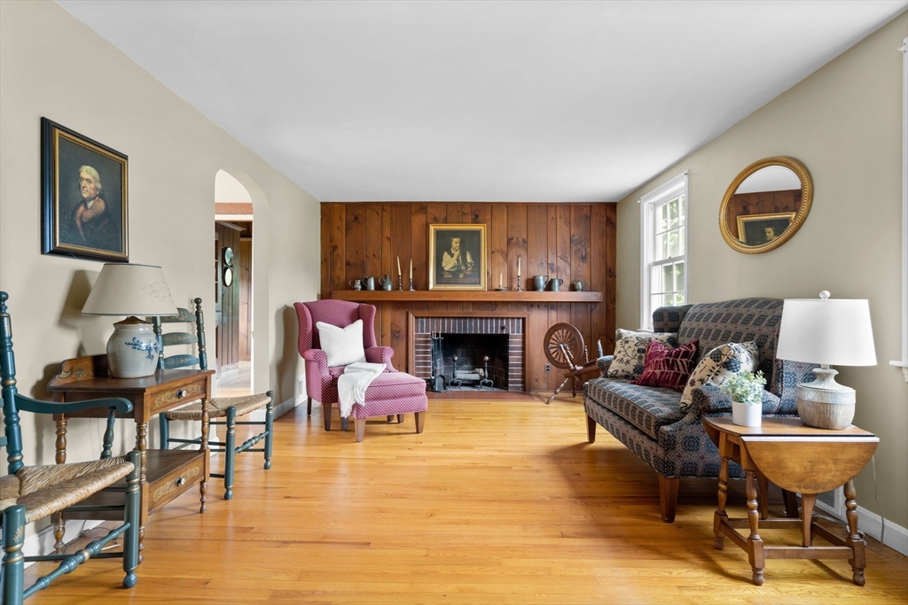 11 Sagamore Road Belmont, MA 02478 - Photo 5 of 41 a living room with furniture and a fireplace