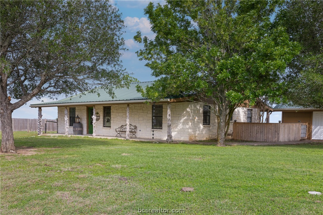 3540 Fisher Ranch Road Bryan, TX 77808 - Photo 21 of 36 a front view of house with yard and tree