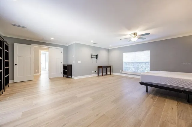 a bathroom with a sink a toilet and a shower