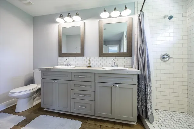 a utility room with washer and dryer