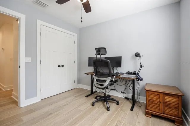 an aerial view of a house with outdoor space