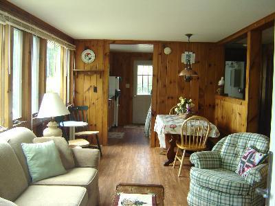 150 Great Pond Road Eastham, MA 02642 - Photo 10 of 14 a living room with furniture and wooden floor