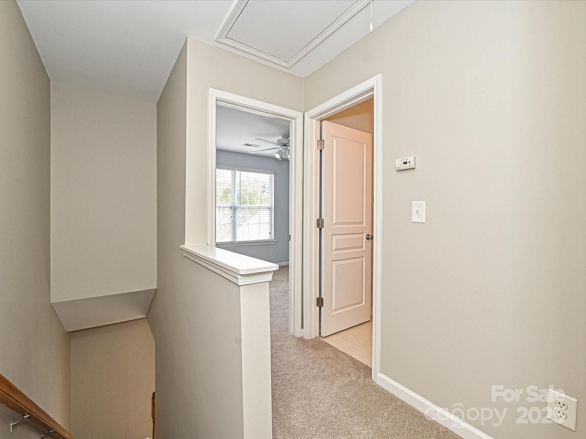 1115 Drummond Lane Matthews, NC 28104 - Photo 11 of 24 a view of an empty room with windows and bathroom