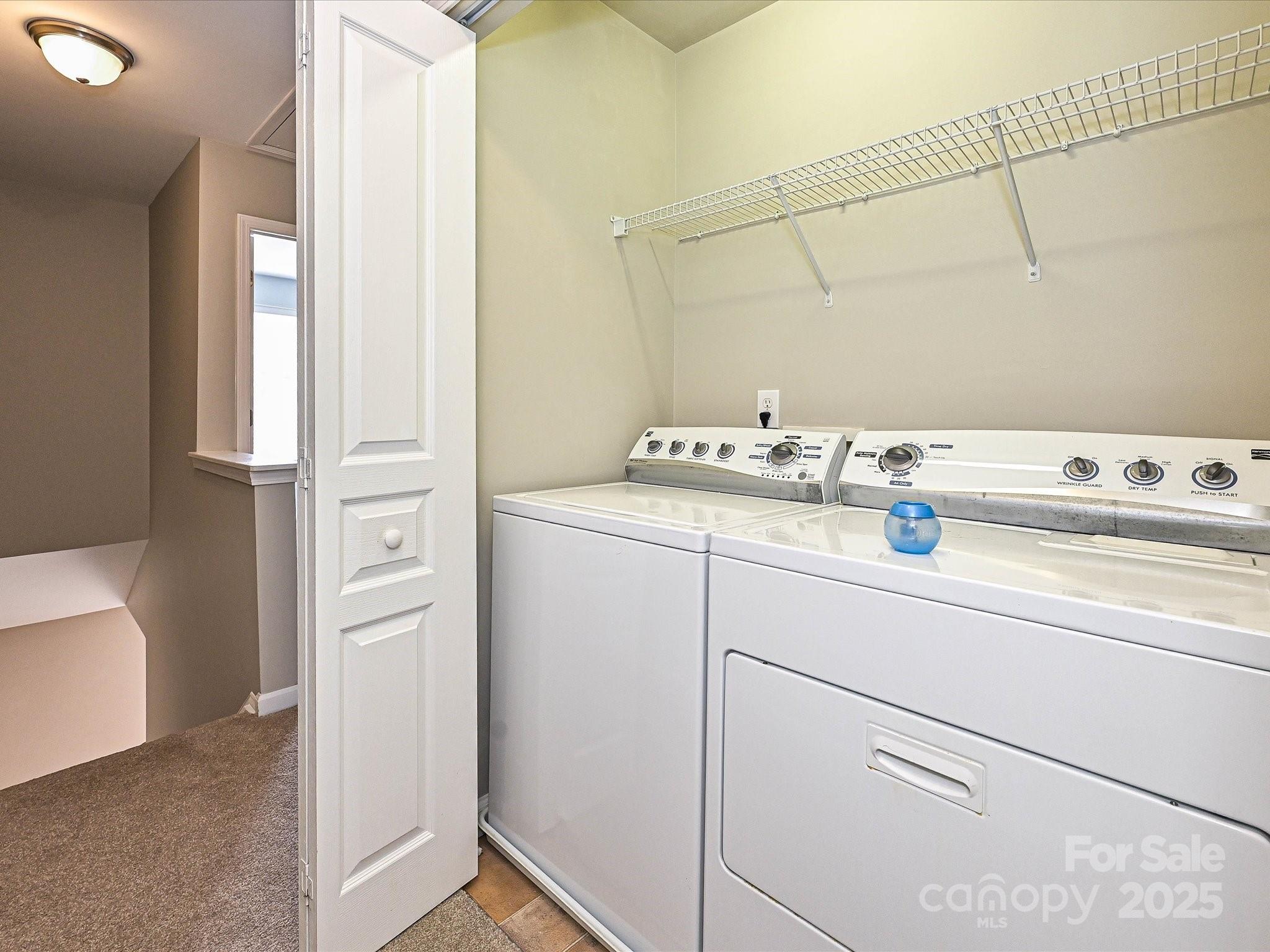 1115 Drummond Lane Matthews, NC 28104 - Photo 12 of 24 a utility room with dryer and washer